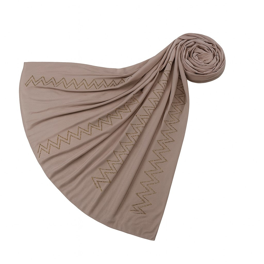 https://www.amaodeyah.com/cdn/shop/files/Beige Premium Jersey Hijab with Golden Zigzag Embellishments.jpg