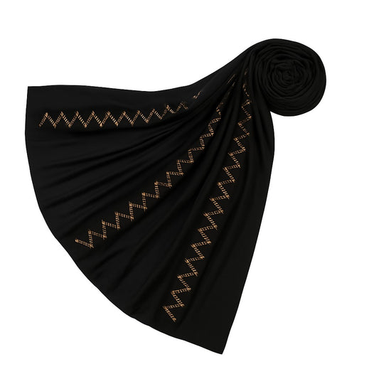 https://www.amodeyah.com/cdn/shop/files/Black Premium Jersey Hijab with Golden Zigzag Embellishments.jpg
