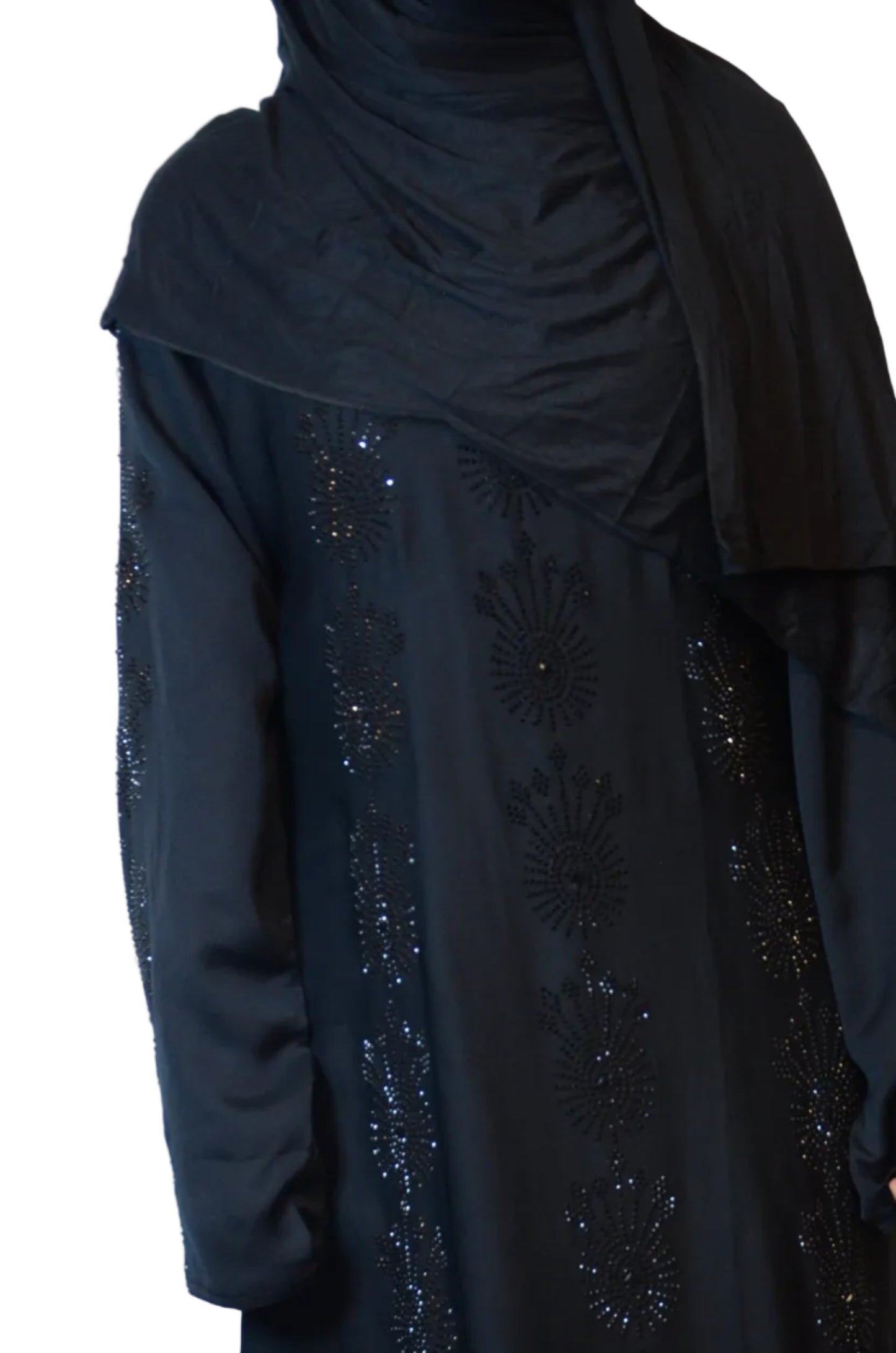 Model wearing a black cotton modal hijab shown from the side, highlighting the smooth fabric drape and lightweight finish
