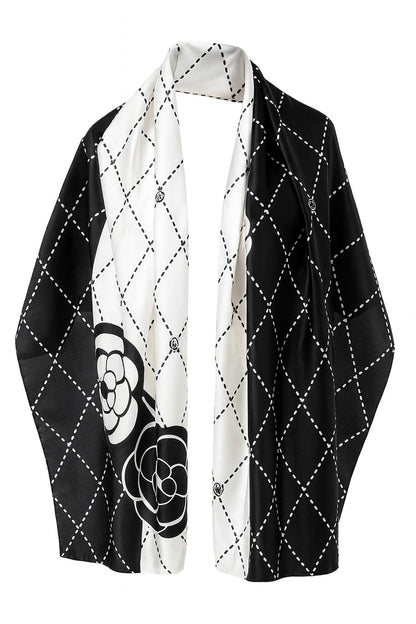 https://www.amodeyah.com/cdn/shop/files/Black_White Luxe Silk Hijab.jpg