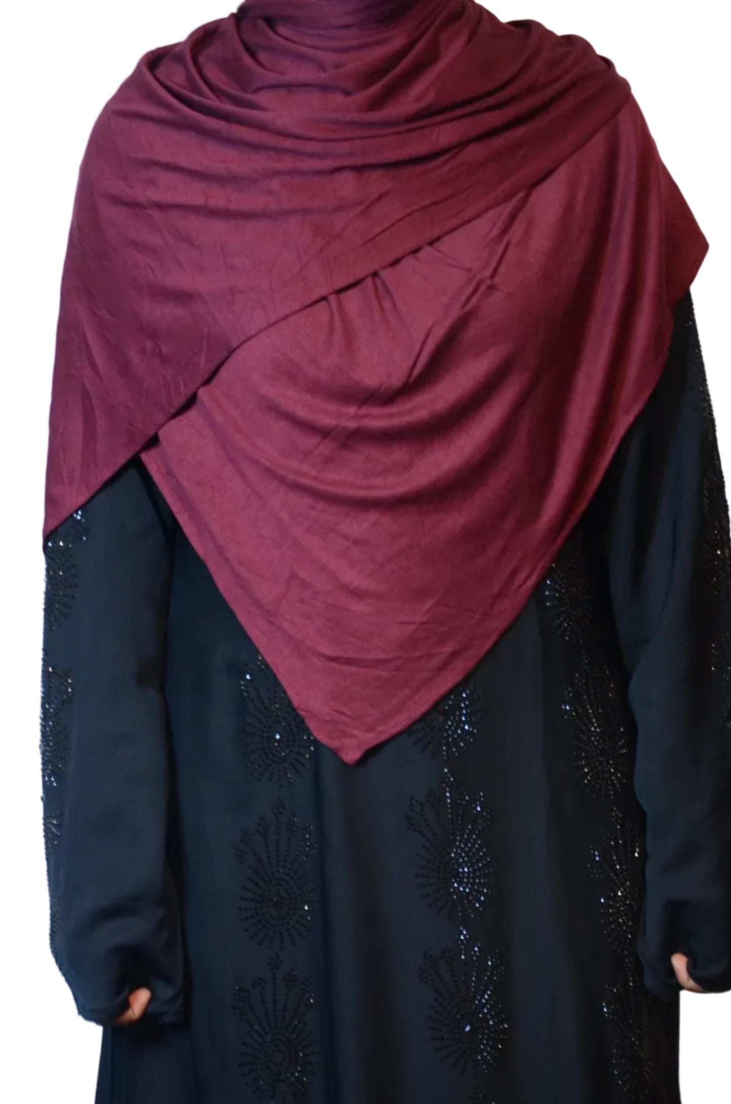 Model wearing a burgundy plain jersey hijab styled with a soft front drape
