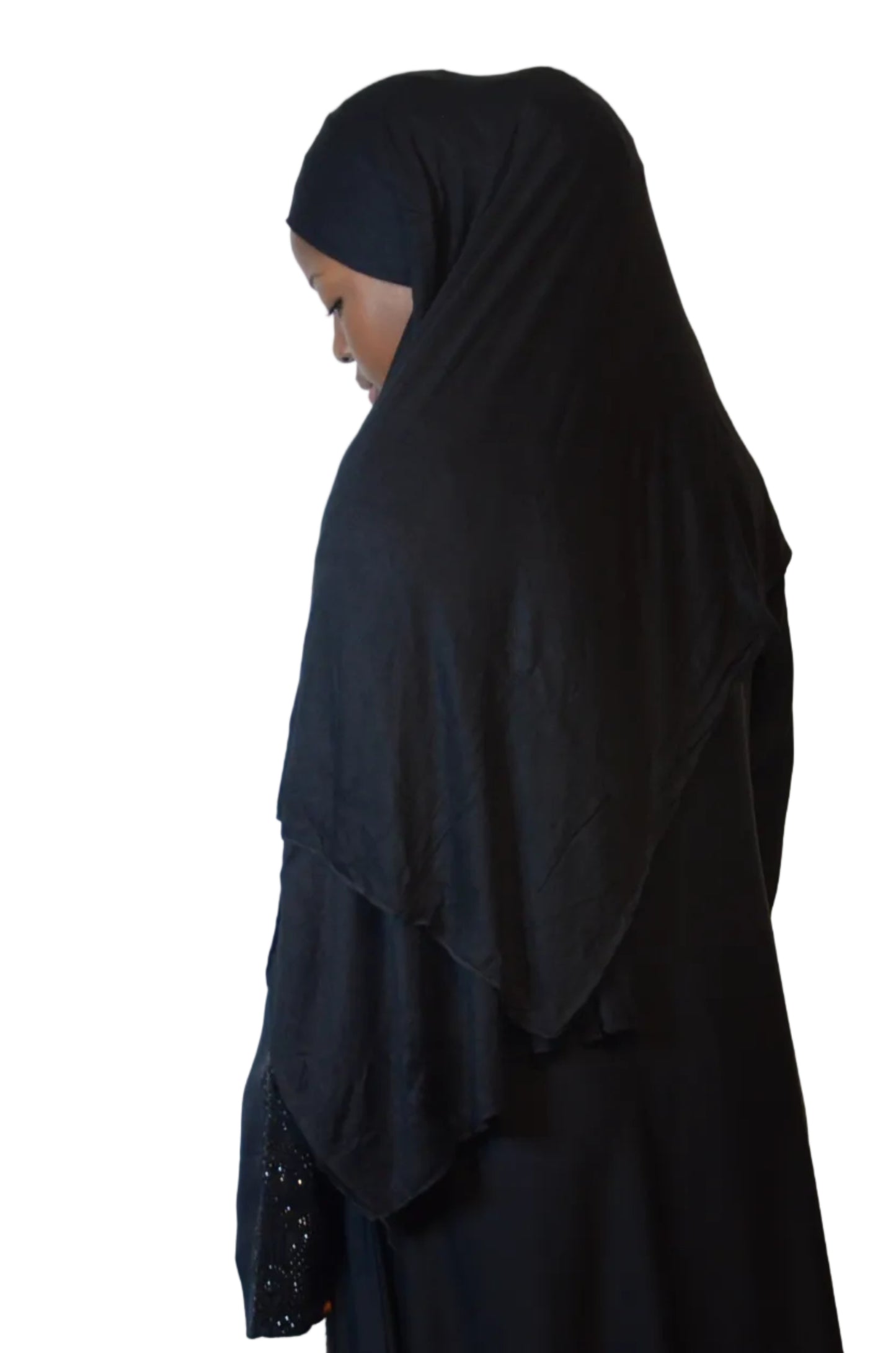 Model wearing a classic black cotton modal hijab styled with a soft front drape for everyday modest wear
