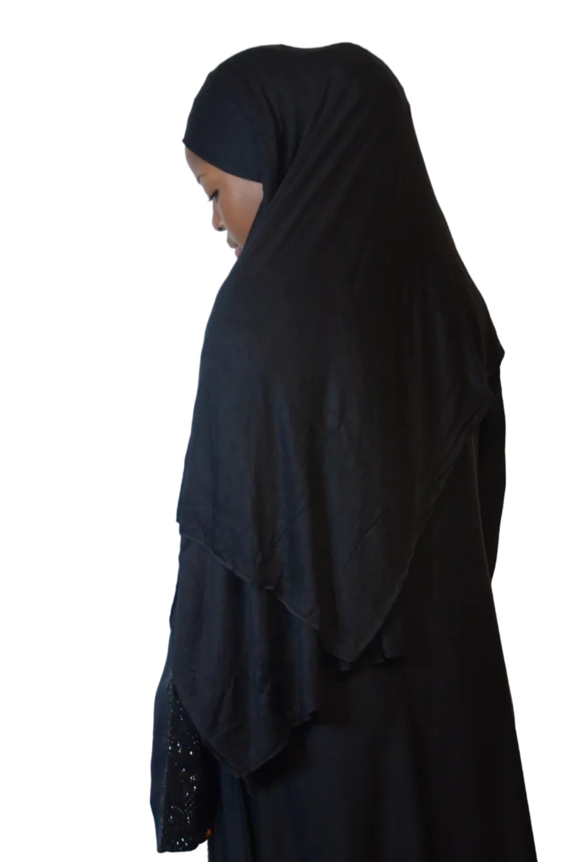 Model wearing a classic black cotton modal hijab styled with a soft front drape for everyday modest wear