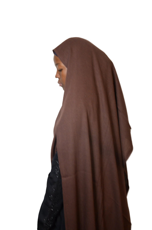 Model wearing the Classic Chocolate Tassel Hijab with a rich tone and relaxed drape
