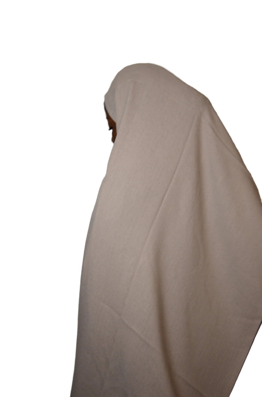 Model wearing the Classic Light Grey Tassel Hijab with a soft drape and tassel detailing