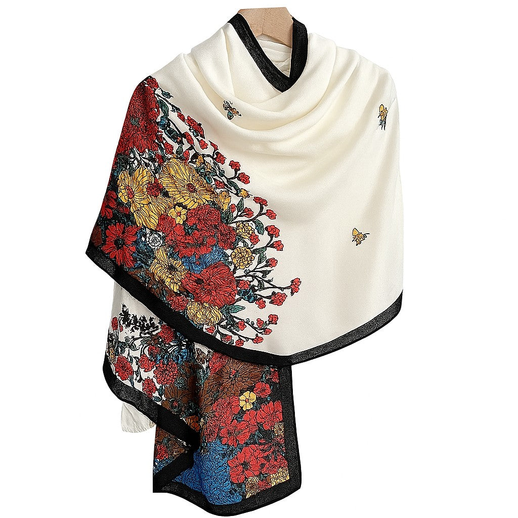 White scarf with colorful floral embroidery on a white background