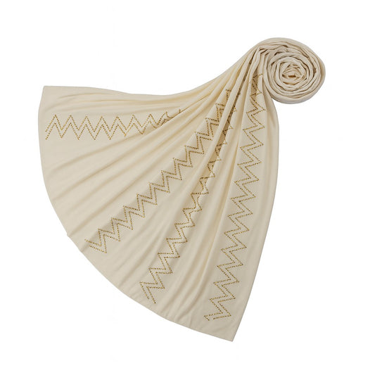 https://www.amodeyah.com/cdn/shop/files/Cream Premium Jersey Hijab with Golden Zigzag Embellishments.jpg
