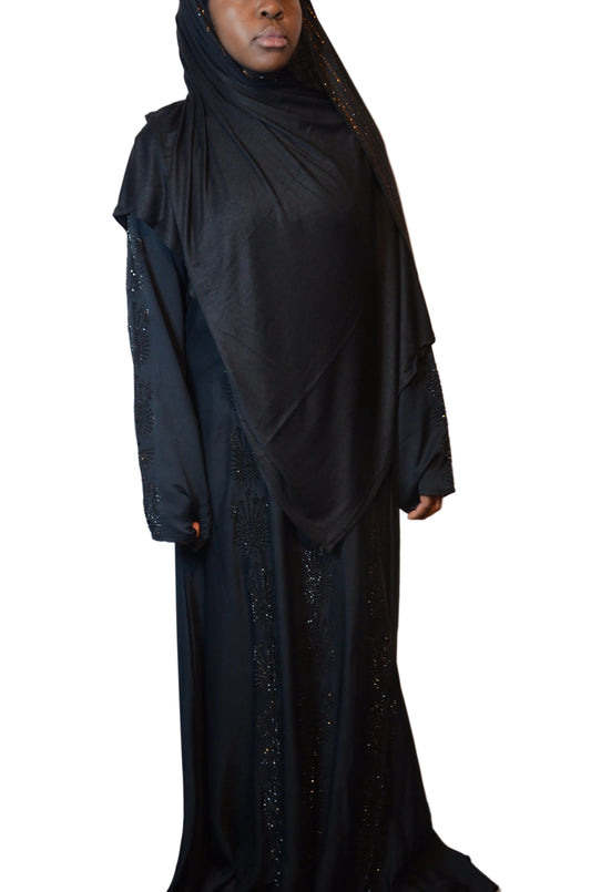 “Model wearing a premium jersey rhinestone embellished hijab styled in a full front drape.”

Image 2 – Side Profile
