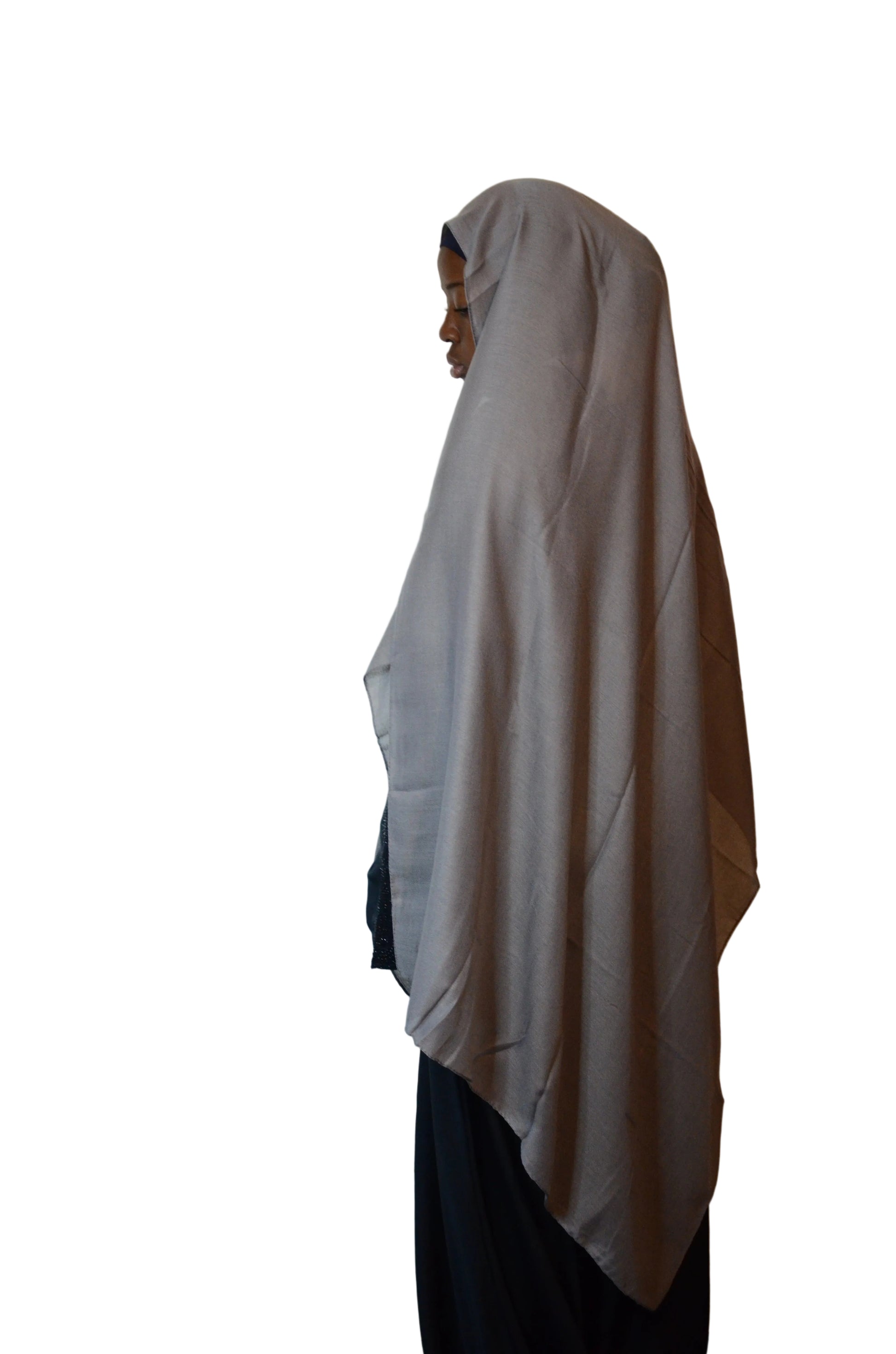 Model wearing a soft grey cotton linen hijab showing lightweight texture and relaxed flow