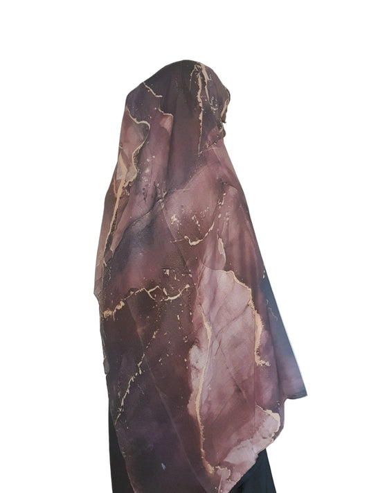 Model wearing a plum marble cotton modal hijab with a full back drape, highlighting the marble print pattern and lightweight texture.