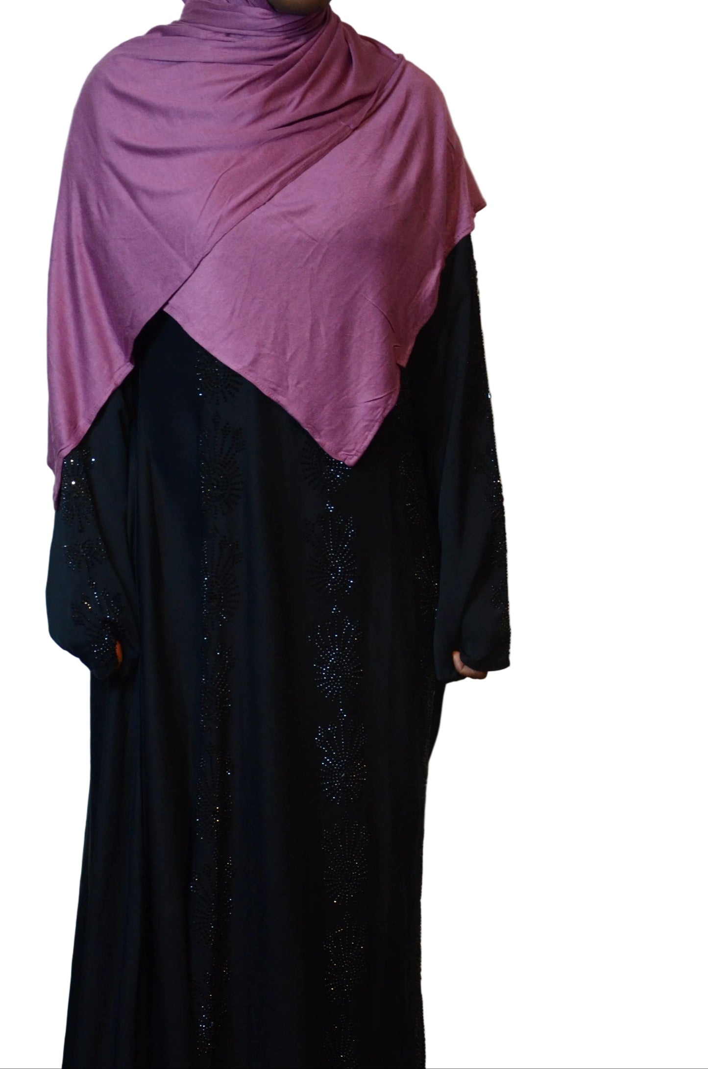 Model wearing a dusty Plum Mauve plain jersey hijab wrapped neatly around the shoulders, highlighting soft texture and comfortable fit.