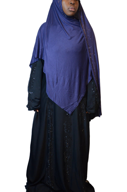 Model wearing a premium jersey rhinestone-trim hijab styled with a soft front drape