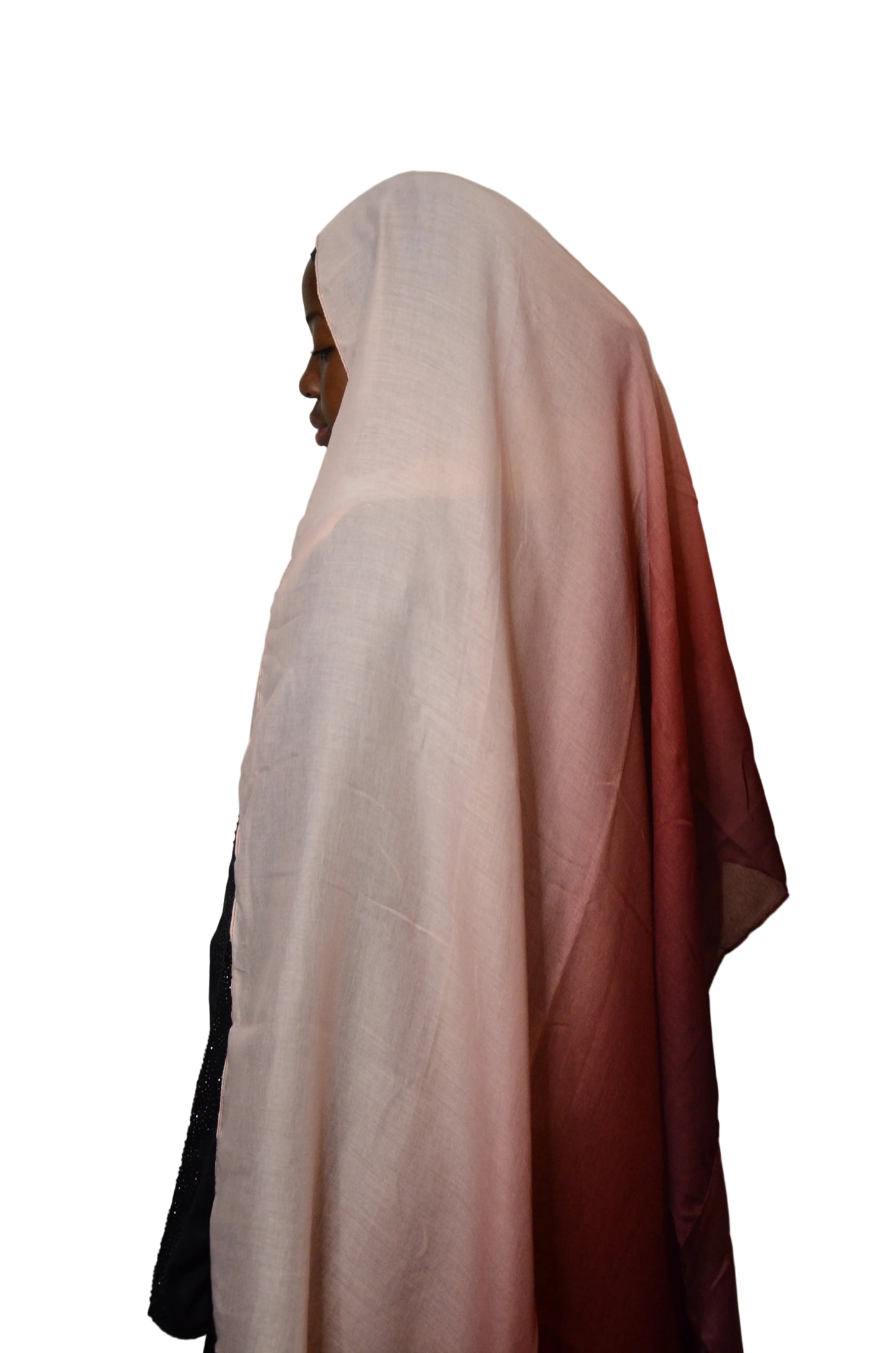 Pink fabric draped over a white surface