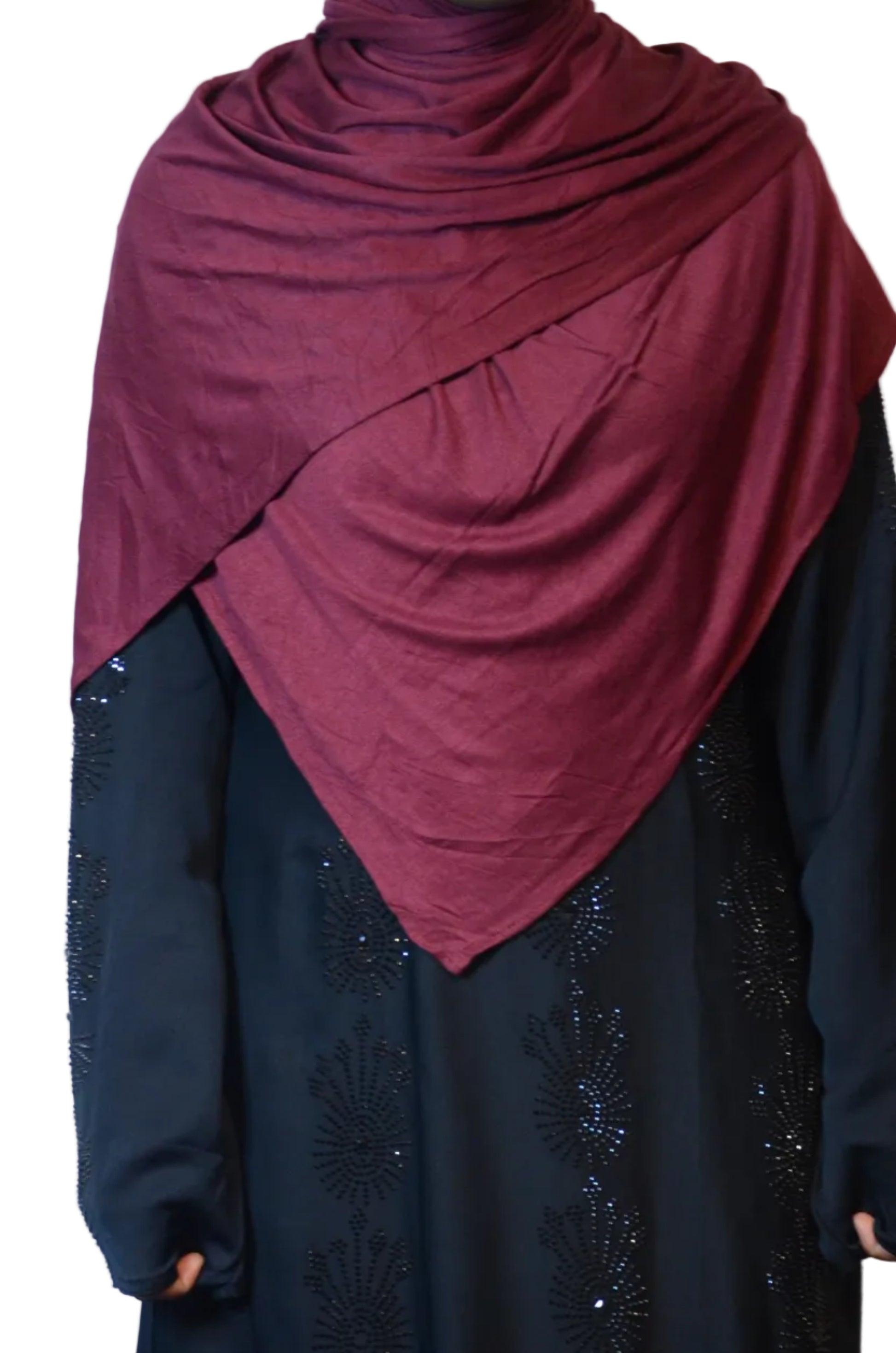 Model wearing a burgundy jersey hijab shown from the side with smooth layering